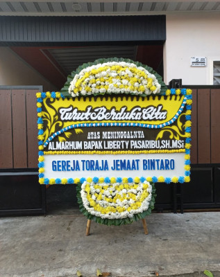 Papan Bunga Duka di Mareku